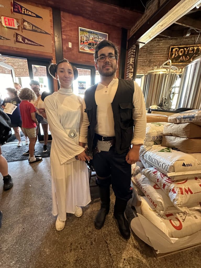 Coupld dressed as a characters Luke & leah from Star Wars at History Class Brewing in downtown Panama City on Star Wars Day
